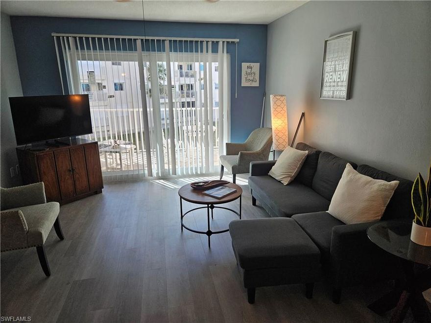 BRAND NEW IMPACT GLASS SLIDERS AND BEDROOM WINDOW JUST INSTALLED AUG 2025! Opportunity seldom knocks twice! Here's your chance, this one is BACK ON MARKET (due to financing) and seller READY to Sell! Lovely Beachside condo with views overlooking the pool, soft, sugary beach, sunsets and gulf beach from your private balcony and even the owner's suite where you can enjoy breakfast in bed with a view of the gulf beach! Recent updates include luxury vinyl plank style flooring and freshly painted throughout! This 2nd floor condo features a split 2 bedroom floorplan, each with their own ensuite full baths and walk-in closets! Leonardo Arms is well maintained condominium complex with DirectTV/Internet included, all NEW PLUMBING, ROOFS and FRESHLY PAINTED EXTERIORS. Conveniently located on the south end of the island across the street to Santini Plaza offering shops, restaurants, marina, trolley stop and seasonal farmers market and events. Close to Lovers Key State Park, Bonita/Estero, Bonita beach and Naples with easy access to I-75 and airports. Get away from the cold & snow and enjoy THIS season in the Sun & Surf!