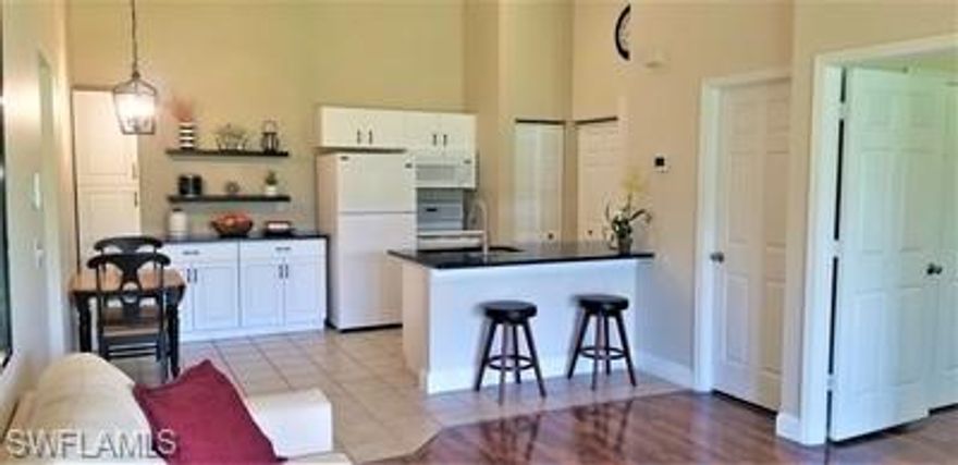 This 2nd floor condo with a landscaped view is available for mid -May 2026 move-in, with NO CARPET. Wood floors and vaulted ceilings make this 1-bedroom condo feel especially large. Close to I-75, great dining, shopping and entertainment and a mere 15 minutes to the beach!