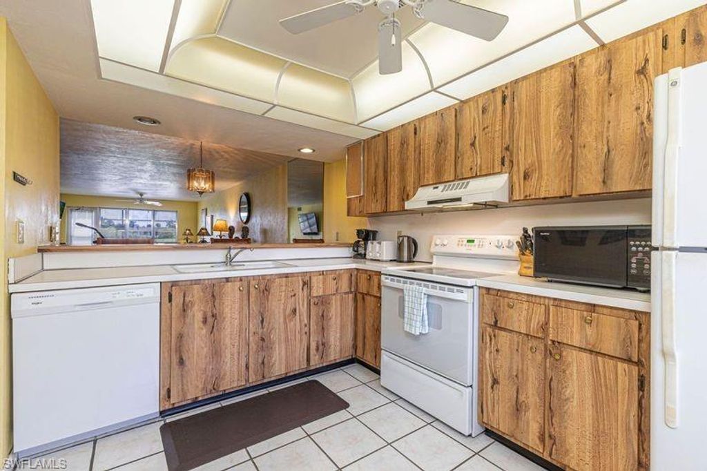 Photo of 3832 Snowflake LN #1207, NAPLES, FL 34112 (MLS # 226005257)