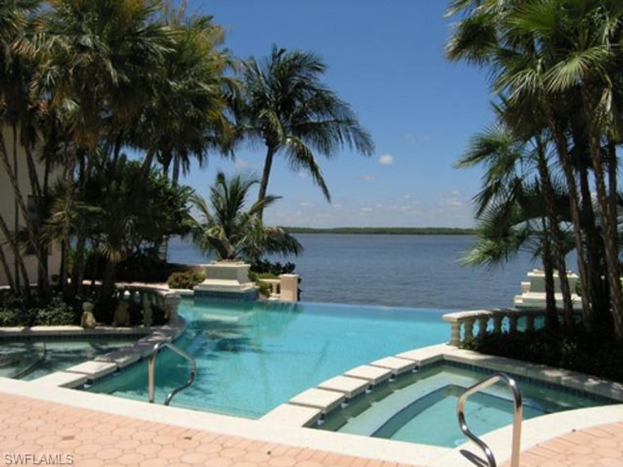 Magnificent River Estate on 2 River lots. Palatial Main House connected to Guest house by dramatic 58' X 24' Great Rm Gazebo all overlooking award-winning pool, gardens, fountains & unsurpassed River views. Extensive built-ins. Soaring ceilings. Graceful archways, grand columns, exquisite moldings, elaborate lighting, porcelain tile, 3 kitchens. New full-house hurricane cloths. Pella windows.