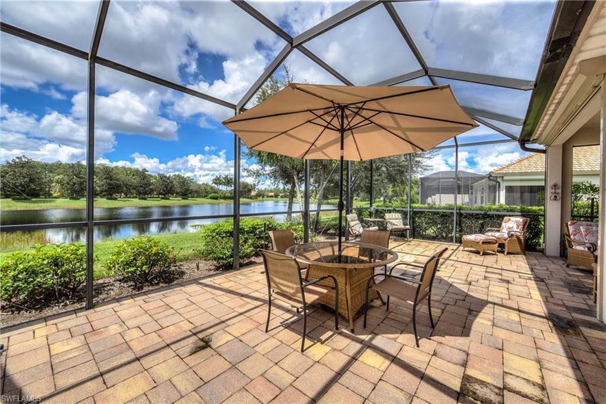 Beautiful 2 bedroom + den home with expanded pavered lanai, premium lake view and electric hurricane screens. This quality-built Centex home offers an efficient great room floor plan with tile throughout, raised baseboards and 8ft doors. The kitchen includes upgraded 42” cabinetry with pullouts and granite countertops. The spacious lanai offers a Jacuzzi with tons of sitting area both undercover and in the sun with a premium lake view. The home has been tastefully decorated with neutral colors and well updated from the electric hurricane screens, pavered lanai, tile on the diagonal and plank tile in bedrooms, phantom screen door and much more! Suffield St is highly desirable due to its close proximity to the amenity center. Bridgetown is one of the premier communities in SWFL. Impressive amenities include resort-style pool and spa, fitness center, outdoor bar, bocce ball courts, tennis courts, catering kitchen, amenity center with a multi-purpose room and much more all with low HOA fees!