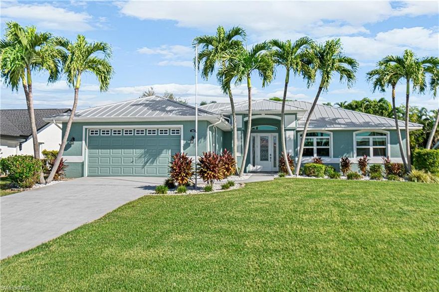 Gorgeous and in a Great Location! This beautiful home in highly sought after SW Cape has everything: METAL ROOF (2021) IMPACT WINDOWS and DOORS (2020) AC with NEST WiFi Thermostat (2019) ELECTRIC SHUTTERS for the Lanai- AND was HIGH and DRY during the storm- NO DAMAGE! Enter the home through the new, custom Front door; you will be drawn through to the most Beautiful and PRIVATE, Pool, Lanai and outdoor space - a true Tropical Paradise where lush, mature landscaping surrounds the Large Screened Lanai and 47 FOOT, HEATED SALTWATER POOL- (your very own LAP POOL) Inside you you’ll find porcelain TILE FLOORS throughout- no carpeting in this home! Custom, 42” solid wood cabinets in the kitchen with NEW (2023) GE PROFILE Appliances and granite counters. Huge Main Bedroom with sitting area and private entrance to the pool. Main bathroom has double sinks, walk in shower with new FRAMELESS Glass door, walk-in closet and separate water closet. The Guest Bath and HALF BATH (2 ½ baths in this home!) have also been tastefully updated. This is truly a GEM of a home, Unique and Beautiful.