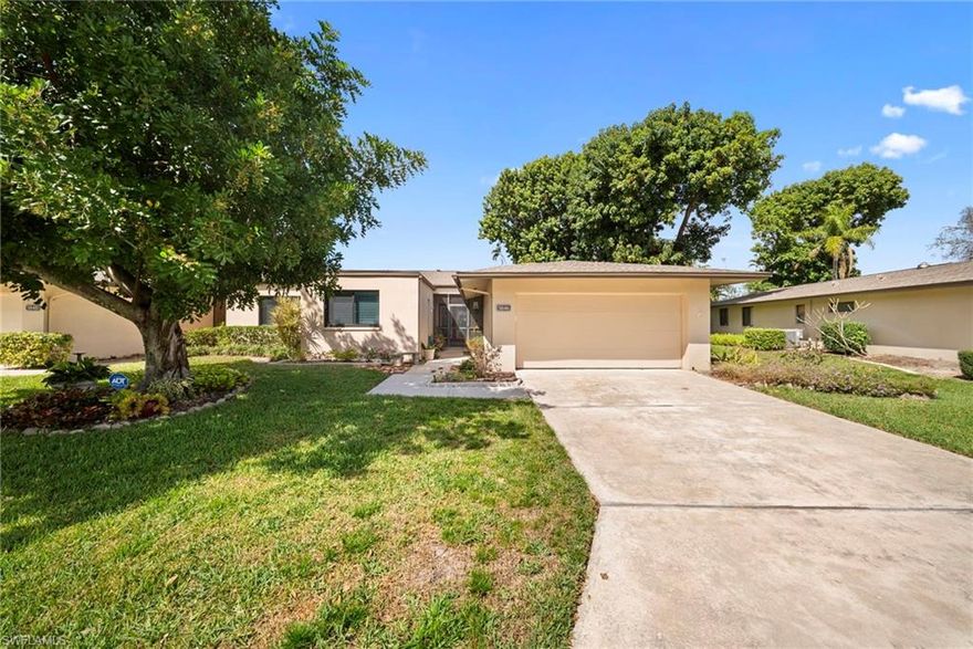 WOW! Gorgeous and spacious 3 BR, 2 BA w 2 Car Garage Villa situated in the serene Wyldewood Lakes community. This 1,745 sq ft home has been beautifully updated (in 2023) including Impact Windows in 2024. You'll love the bright and inviting kitchen with white hardwood cabinets, granite countertops, and a stylish backsplash with abundant cupboard and counter space. Dine at the expanded counter or formal dining room. Luxury Vinyl flooring flows throughout most of the home. Love entertaining? This home is for you! The huge living room with vaulted ceiling is great for a comfortable gathering or spread out into the area off of the kitchen or take in the landscaped views in the enclosed lanai under air with newly rebuilt floor-to-ceiling impact windows and door. Step right out to grill or relax on the paver patio and take in nature's beauty with plenty of green space and privacy. Enjoy the comfortable primary suite featuring two closets, including a walk-in closet plus Linen closet and a gorgeously upgraded bathroom with a quartz dual-sink/counter. Stylish accents adorn this home including Plantation Shutters, Crown Molding, recessed lighting and updated light fixtures and fans. Wyldewood Lakes offers stress-free living with lawn maintenance, pest control, cable/wifi, roof maintenance, PLUS community pool and Tennis/Pickleball courts. This is not a 55+ community nor in a flood zone. Love to golf or enjoy a social atmosphere? Jump in your golf cart and head down to the Whiskey Creek Country Club and join the golf or social membership or dine at the public restaurant.