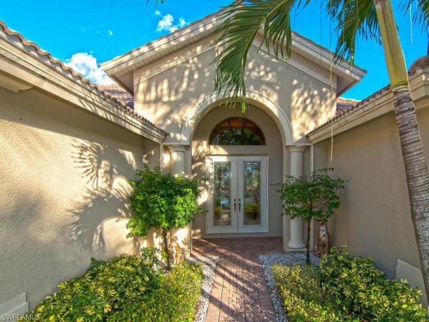 BRAND NEW ROOF, A/C, PAINT & POOL CAGE – ALL AT THE LOWEST PRICE IN VILLA TUSCANY! Unique builder’s model has 2 ft. higher ceilings throughout and is located on a coveted upgraded lot on a quiet cul-de-sac. 3 ensuite bedrooms and a 4th convertible bedroom with 3 full baths. Wide open and spacious floor plan includes floor-to-ceiling sliding pocket doors in every room with a breathtaking and expansive view of the golf course. A chef’s gourmet kitchen features granite and stainless steel, an oversized center island with additional storage and eat-in area. All rooms open onto the enclosed courtyard-like pool area which boasts a fabulous waterfall and cascading spa. PALMIRA GOLF & COUNTRY CLUB an extraordinary lifestyle and golf community that contains 1,000 acres of lush landscaping in a safe and spectacular setting. The golf course is a flagship Gordon Lewis design with a total of 27 holes. Social members who purchase this home can plan unlimited golf between May 1st and October 31st without becoming full golf members for a nominal fee. The community also has a state of the art sport-fitness club, a 2,800 sq. ft. heated lagoon style pool, clay tennis courts, bocce and pickle ball.