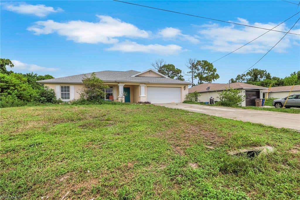 Photo of 277 Grant BLVD, LEHIGH ACRES, FL 33974 (MLS # 226027026)
