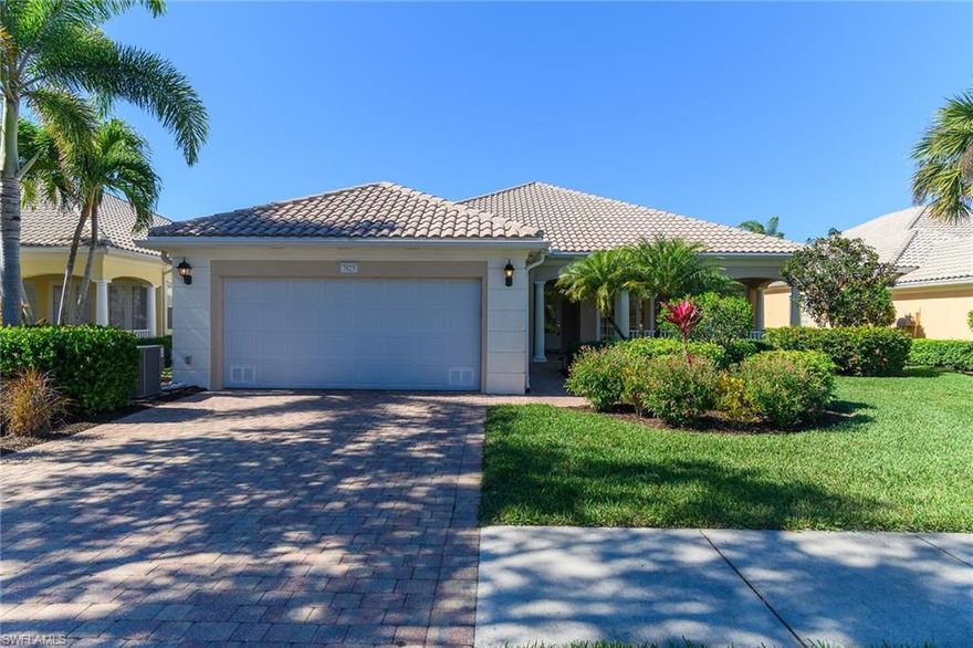 Come see this rarely available Carlyle model in the popular Verona Walk community. This original DiVosta-built home has poured concrete walls, a built-in vacuum cleaning system, and a tiled front porch that leads to an airy foyer. Enjoy sophisticated Florida living in your formal extended living and dining rooms plus a fifth bedroom. NEW kitchen appliances, including refrigerator & microwave. Recent updates include HVAC (2023), hot water heater (2023), pool pump & heater (2024). Also features garage door opener w/keypad, generator hook-up, battery backup, plantation shutters, uplit landscaping, and bonus Robb & Stucky wall unit. Spend your time outside enjoying the heated pool with a water view and complete privacy due to its location on a private cul-de-sac. Verona Walk offers 24-hour security with guarded gate, large resort style community pool, lap pool, 6 pickleball courts, 8  tennis courts, bocce ball, basketball courts, gym, kids’ playground, and walking paths with bridges. Town Center includes the newly-remodeled Verona Grill Restaurant, the Pink Frog ice cream shop, Salon at Verona Walk, travel agency, gas station, post office,  library, computer center, ballrooms for events, card rooms, and activity director. Reasonable HOA dues that include cable TV with DVR, internet, ADT and lawn care. A short drive to Downtown Naples & Marco Island for fine dining, beaches, and boating and to Physicians' Regional Medical Center.