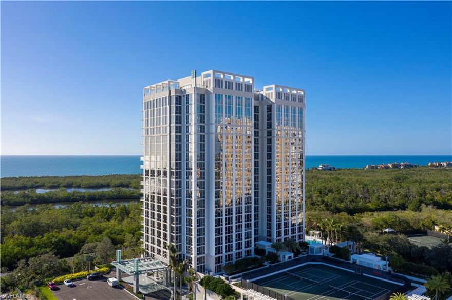 C627- Developer-furnished models beware! You’ve just been upstaged by this simply sinful, spectacularly exquisite JEWEL! Who knew the current first owners of this show-stopping 2019 Ultra-Luxury Mystique Tower 603 residence were much like master orchestra conductors, selecting The Award-Winning Dream Team of BCB Homes, as the General Contractor, & Marc Michaels as the Interior Design Firm, who were then guided, every step of the way, by the owners’ magic conductor’s wand. This dedicated team patiently, diligently, and successfully transformed what was once a raw, chilly, concrete floor, white wall “designer-ready” space into a warm, welcoming, gently edgy, quietly sophisticated, happy home masterpiece. (Flip flops still allowed.) This precious JEWEL commands your very prompt attention, due to its extensive menu of custom designer flooring, wall, window, and ceiling details, hand-crafted cabinetry, closets, wardrobes, spectacular and impactful multiple chandelier and sconce lighting accents complementing a multitude of designer backgrounds & finishes. All are gifts for your effortless enjoyment, as all remain on property. Pelican Bay Membership privileges included, too! Don't wait!