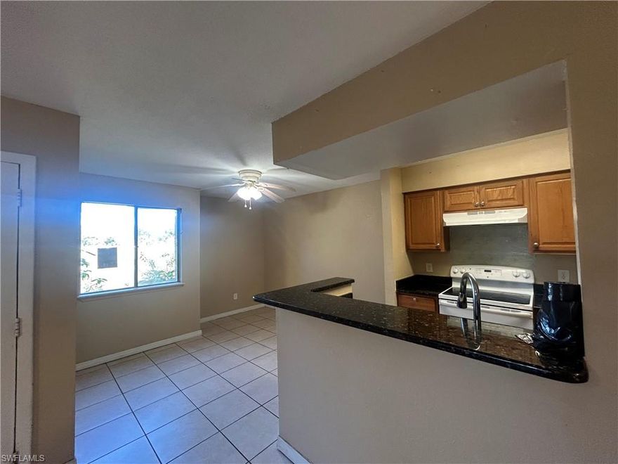 THE SELLER JUST SWEETENED THIS DEAL; THE PURCHASE PRICE HAS BEEN REDUCED AGAIN AND NOW INCLUDES 12 MONTHS OF PRE-PAID HOA DUES AFTER CLOSING!!!!! BRING YOUR HIGHEST AND BEST OFFER BEFORE JANUARY 9TH!!! What an exceptional opportunity to own this 1st floor, 2 bedroom, 2-bathroom, waterfront condo with a private patio in a community that’s undergoing a full-scale transformation with the buyer incentives that are included. SELLER WILL ALSO PROVIDE A BRAND-NEW WHITE TOP LOAD WASHER AND DRYER MATCHING SET IN THE UNIT PRIOR TO CLOSING!!! This unit could be perfect as a primary residence or investment rental property. This community has a higher rate of tenant occupants than owner occupants making this unit a possibly great property to add to your investment portfolio. This unit is being is sold as-is, the sellers purchased the unit through a foreclosure sale, and buyers are encouraged to complete all due diligence prior to submitting an offer. Proof of cash funds must accompany all offers. Please note that escalation clauses will not be accepted, and an escrow deposit equal to 5% of the purchase price will be due within three days of contract acceptance. A Phase I and II Milestone Report is available upon request. These reports outline the repairs and renovations planned for the community, that caused a special assessment for the community. The buyers will not have any special assessments due from the current renovation ongoing from the milestone report, giving the new owner the benefit of major community upgrades at no added cost to them. The community improvements include new staircases and balconies Impact-rated hurricane windows and doors, fresh exterior paint for all buildings, a resurfaced and beautifully updated pool and spa area, newly paved parking lot (already completed) These enhancements will not only elevate the community’s curb appeal but also add long-term value and durability to the property. For those seeking a low-maintenance primary home or a rental investment with future appreciation potential, schedule your showing and bring your offers. Conveniently located near shopping, dining, schools, and major highways and the RSW airport as well as bus transportation conveniently located outside the community.