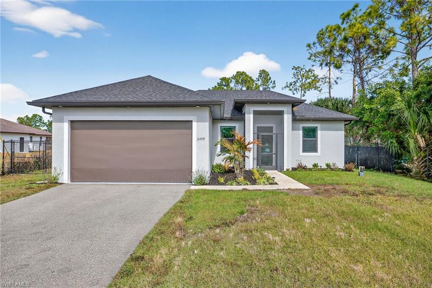 HOME SWEET HOME!! Built in 2023, this stunning 3BR/2BA home sits on over an acre in the heart of Golden Gate Estates. Enjoy FULL front and rear fencing with ELECTRIC gated entry, screened front entry, and a spacious screened lanai for year-round outdoor living. The open floor plan, no HOA, and generous lot provide endless possibilities for pets, boats, or RVs. Set in an A+ school district and an unbeatable location, this property perfectly balances privacy, space, and contemporary comfort—don’t miss this opportunity! This home won't last!!