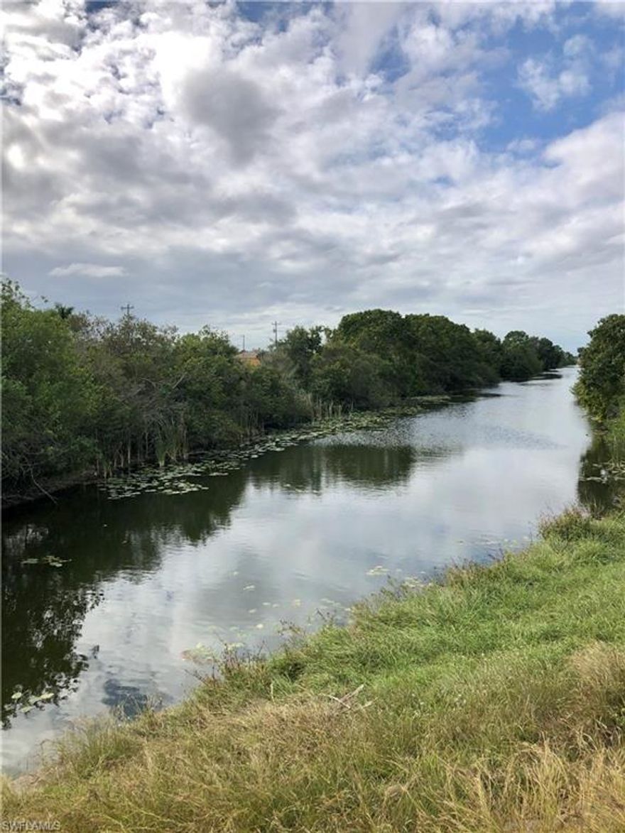 Waterfront lot with southern exposure and ready to build a beautiful home. Close to shopping, golf, schools, restaurants, water park and Pine Island. Freshwater lot on approx 100 ft wide Valencia Canal. Canal connects to miles of freshwater canals and lakes for fishing, kayaking and boating. Cape Coral and Fort Myers is the 4th in nation for job growth and home to two baseball teams for spring training, Boston Red Sox and Minnesota Twins. Zone X - Out of Special Flood Hazard Area. Buyer to perform due diligence.