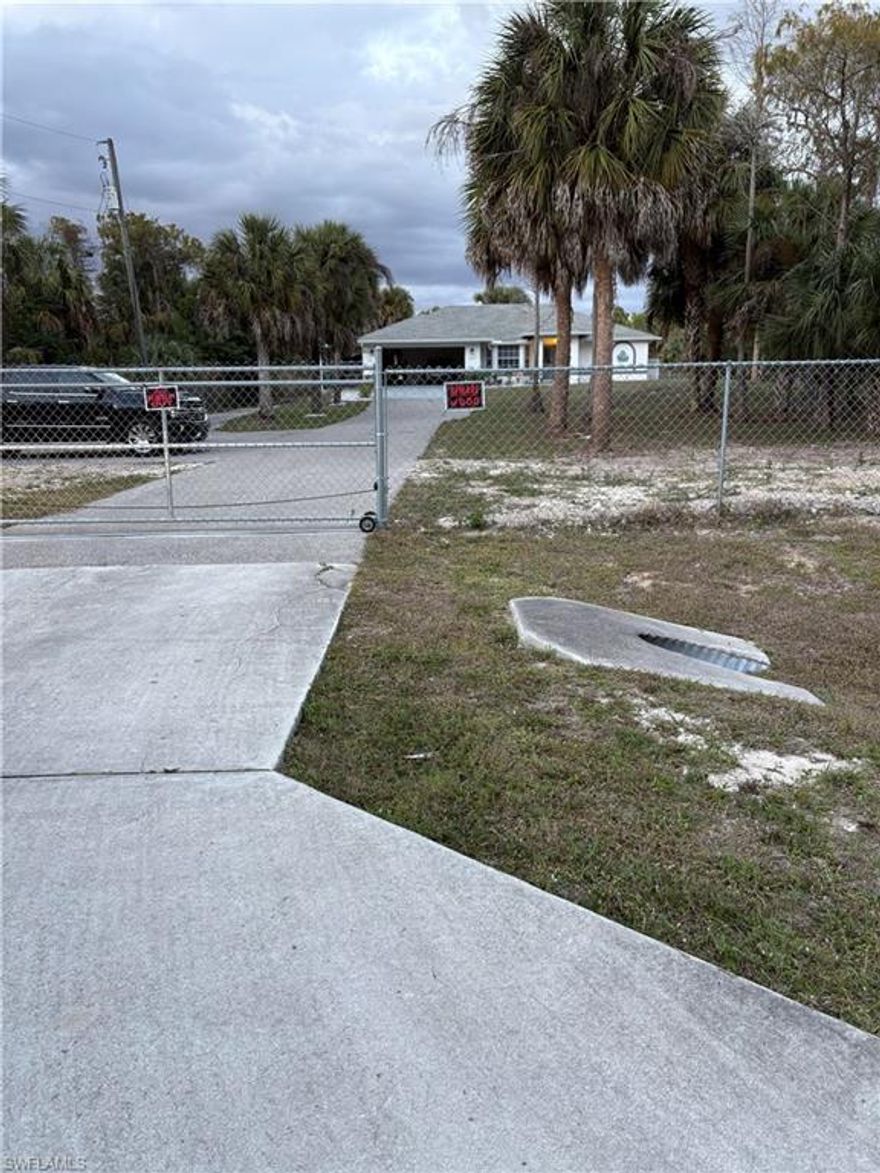 Newly remodeled home, 3/2/2 in Golden Gate Estates. Property is cleared and completely fenced in, with electric gate and keypad.Upscale cabinetry, large tile through out home. This home features livingroom and seperate family room, large spacious kitchen with breakfast bar, fine art mural on wall, large open and covered back Patio.Plenty of space for a pool, horses or all the toys you want. New roof in 2019. This home is close to schools, National Preserve, parks, two blocks from Golden Gate Blvd. and the commercial corners.
You won't need any fixing up on this one, it is ready for you to move in and start making memories. You don't want to miss this jem that awaits you.