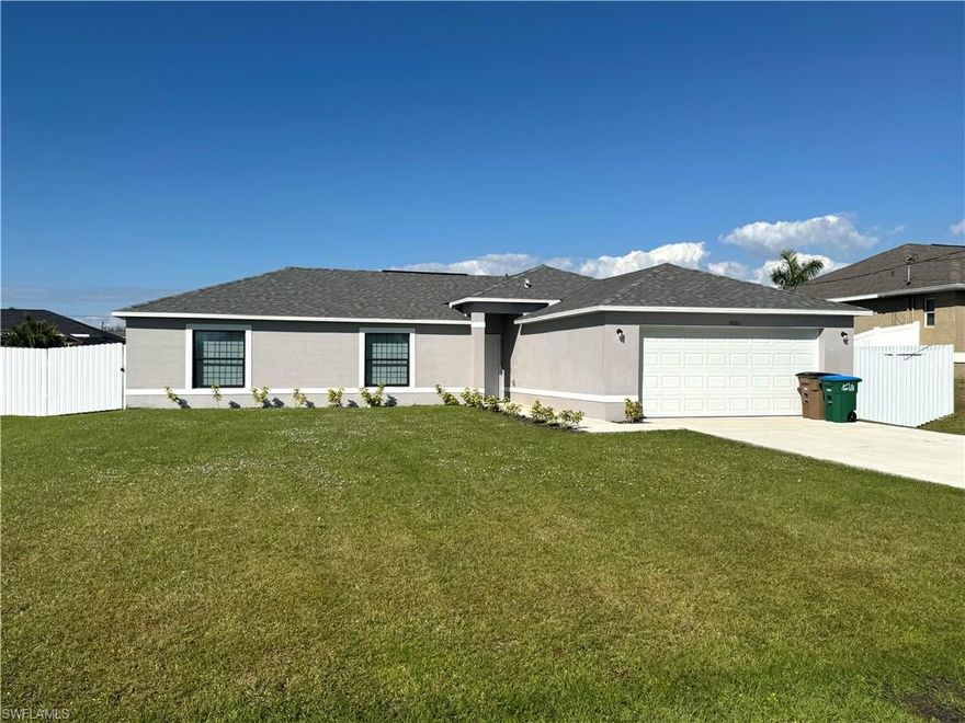 Brand-new 3-bedroom, 2-bath home for annual rental in SW Cape Coral, built in 2024. This bright and airy home lets in plenty of natural light and features tile flooring throughout, a vaulted ceiling, a spacious master suite with a walk-in closet, tiled walk-in shower, and his and hers sinks. The kitchen boasts stainless steel-wrapped appliances, granite countertops, and ample cabinet space. Enjoy a fenced backyard, a 2-car garage with plenty of driveway parking, and the convenience of an INCLUDED WASHER & DRYER. Located just 2 minutes from Chiquita Blvd S and 3 minutes from SW Pine Island Rd, with lawn service covered by the owner. Available now! Owner is asking for first month and security deposit for move in.