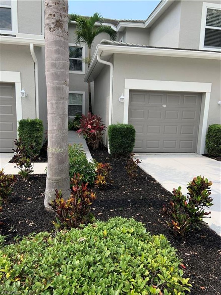 Come see this beautifully updated condo.  It features 2 beds plus den with split floor plan and 2 full baths.  New flooring installed in main living area, den and lanai replicating wood flooring but in fact easy to maintain tile.  This is an end unit backing up on a quiet wooded dead end street. The community of Champions Green has its own swimming pool.  Memberships at The Club at Gateway are available but not mandatory.  The club offers golf, tennis, bocce ball, pickle ball, resort style swimming pool with outside bar and fine and casual dining. Gateway is close to a newer Publix plaza featuring restaurants, Boston Red Sox spring training, RSW airport and Gulf Coast Town Center.