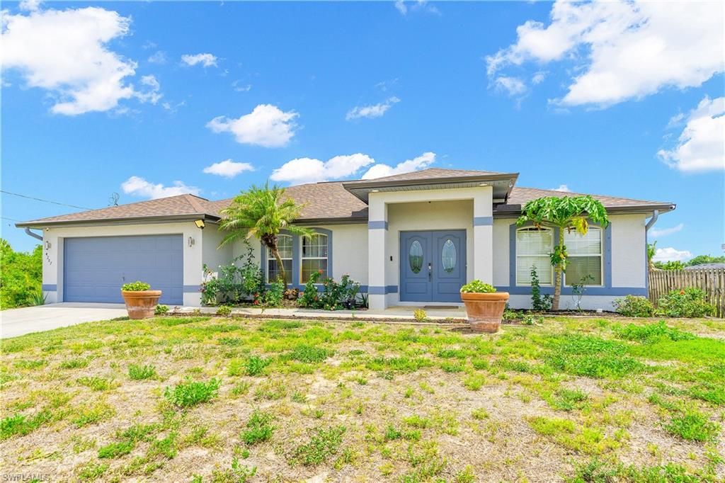 Photo of 4207 30th ST SW, LEHIGH ACRES, FL 33976 (MLS # 226019559)