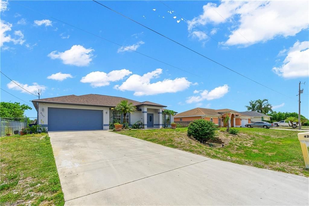 Photo of 4207 30th ST SW, LEHIGH ACRES, FL 33976 (MLS # 226019559)