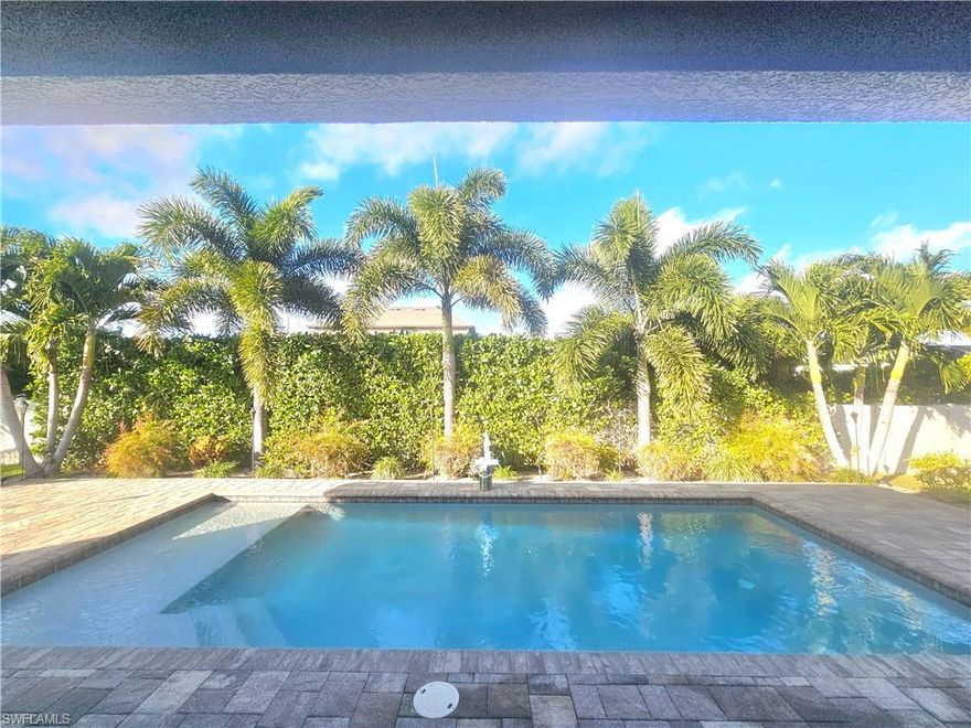 Luxury 4BR Home with Private Pool | Prime SW Cape Coral Location

Welcome to your private slice of paradise in highly desirable Southwest Cape Coral. This beautifully designed, fully furnished four-bedroom, three-bath with den luxury home offers the perfect blend of tranquility, style, and convenience — ideal for families seeking a premium Southwest Florida living.

Nestled in a quiet, upscale neighborhood yet centrally located near shops, dining, & Surfside's scenic walking and biking paths, this home offers the best of both relaxation and accessibility.

Elegant Open-Concept Living. From the moment you step through the front door, you’re greeted by a stunning entryway that opens into a spacious living area with soaring ceilings and an airy, open floor plan. Natural light pours in, creating a bright and inviting atmosphere throughout.

The family room flows seamlessly into the dining area and kitchen, making it easy to gather, entertain, and stay connected. The large center island offers generous prep space while keeping everyone at the heart of the conversation, perfect for creating lasting family memories.

Step outside to your own private resort-style setting. The expansive pool deck invites you to: 
Relax on lounge chaises, Take a refreshing swim, Fire up the BBQ, Dine outdoors, Enjoy unforgettable Southwest Florida sunsets. The north-facing pool offers comfortable sun exposure throughout the day, making it perfect for long afternoons by the water.

Prime Location, enjoy quick access to everything Cape Coral and Southwest Florida have to offer: 10 minutes to Matlacha, 40 minutes to Fort Myers Beach, 45 minutes to Southwest Florida International Airport (RSW), Minutes to shopping, dining, marinas, and local attractions. With over 400 miles of scenic canals, beautiful beaches, nature preserves, waterfront dining, and endless outdoor activities nearby, adventure is always within reach.

Included Amenities: Lawn service, pool service for private pool (north exposure), 4 bedrooms (1 King, 2 Queens, 1 Full), 3 full bathrooms (2 en-suite, 1 shared), Gourmet kitchen with stainless steel appliances & a double oven, Dining table seating 6–8, Breakfast bar seating 4, Den with a desk perfect for someone that works from home, Washer & dryer, Automatic garage door opener.

This immaculate, thoughtfully designed home offers everything you need for comfortable Southwest Florida living. We look forward to welcoming you and your family to sunny Cape Coral!