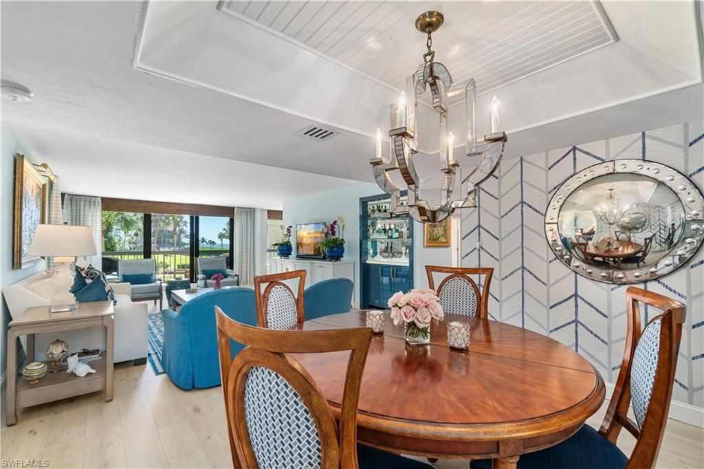 Photo of 4551 Gulf Shore BLVD N #205, NAPLES, FL 34103 (MLS # 225076519)