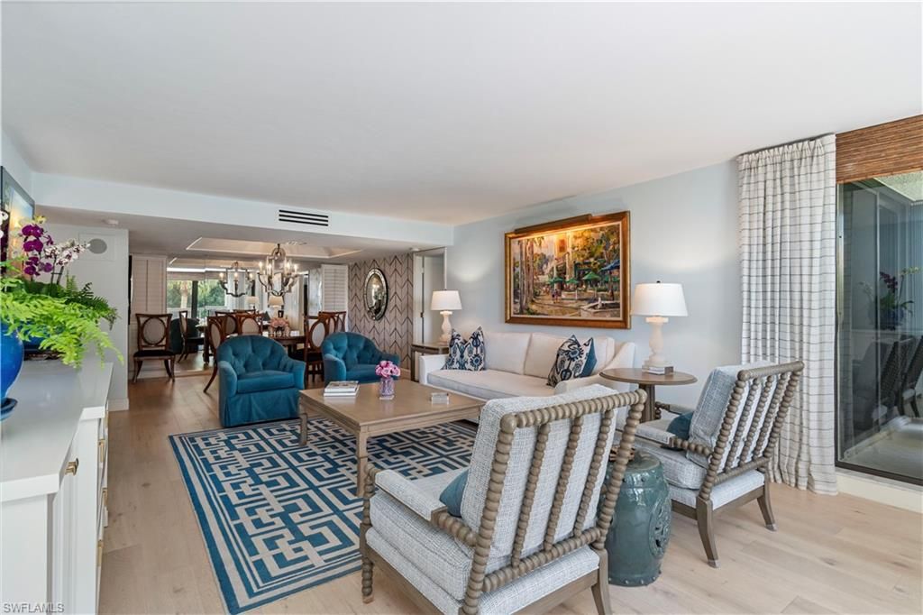 Photo of 4551 Gulf Shore BLVD N #205, NAPLES, FL 34103 (MLS # 225076519)