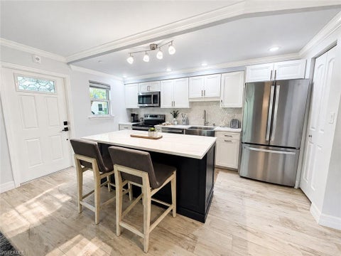 Photo of 960 7th ST S #103, NAPLES, FL 34102 (MLS # 226031250)