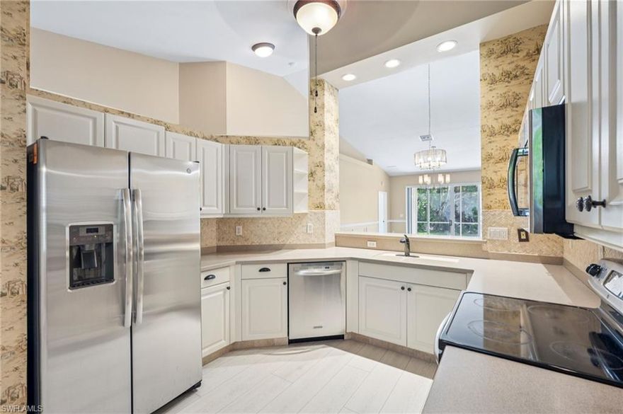 Step into a home that redefines what move-in ready truly means in Naples. Located within the gated community of The Sanctuary at Blue Heron, this beautifully upgraded 3 bedroom, 2 bath residence offers a rare combination of modern style, thoughtful updates, and long-term peace of mind. From the moment you enter, you’ll notice the difference. New designer lighting brightens the main living areas, enhancing the natural light that pours in through vaulted ceilings and an open, flowing layout. Fresh interior paint and updated flooring in all bedrooms create a clean, cohesive, and contemporary feel, making this home truly turnkey with no renovation stress required. The kitchen is equipped with newer stainless steel appliances and opens seamlessly into the living space, creating an ideal environment for both everyday living and entertaining. Beyond the main living area, sliding doors lead to a screened lanai that feels like a private retreat, overlooking a lush preserve with no rear neighbors. This peaceful setting offers complete privacy and a quiet backdrop for morning coffee or evening relaxation. The primary suite is spacious and well-appointed, featuring an oversized walk-in closet and a luxurious en-suite bath with dual vanities, a soaking tub, and a separate walk-in shower. A split bedroom floor plan provides privacy for guests or family, with two additional bedrooms and a generously sized second bath. Practical features continue with a two-car garage, a separate laundry room, and a layout designed for both comfort and functionality. What truly sets this home apart is the level of protection and simplicity it offers. With full impact-resistant windows and a tile roof installed in 2021, major structural concerns have already been addressed. The association further enhances this low-maintenance lifestyle by covering high-speed internet, cable, water, sewer, lawn care, pest control, exterior maintenance, and master insurance including flood, leaving you with minimal overhead and maximum peace of mind. Residents also enjoy resort-style amenities including a heated pool, renovated fitness center, tennis and pickleball courts, and a welcoming clubhouse, all within a secure and well-maintained environment. Ideally located just minutes from I-75, shopping, dining, and Naples’ world-renowned beaches, this home offers the perfect balance of convenience and tranquility. Priced at 424,900, this property stands out as a premier opportunity for buyers seeking a fully upgraded, hurricane-ready home with exceptional privacy and long-term value in one of Naples’ most desirable communities.