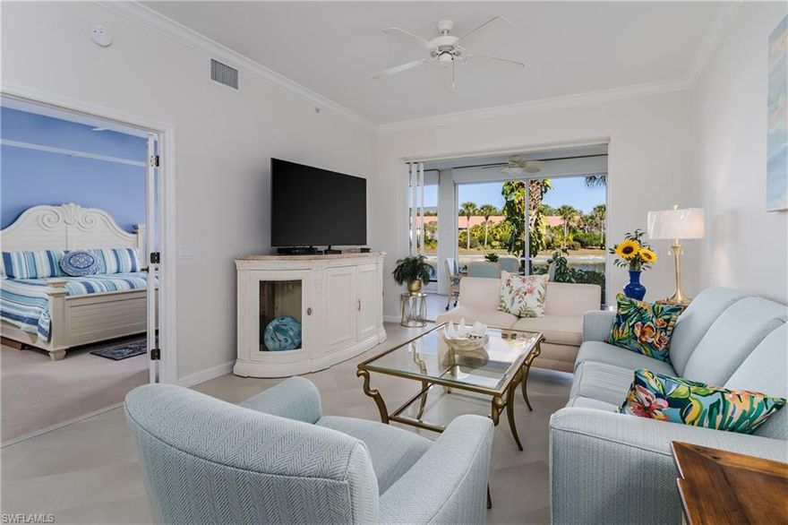 Welcome to effortless Florida living in this charming first-floor condo located in the highly sought-after Falling Waters Beach Resort. No stairs and peaceful lake views! 

Just one building from the clubhouse and resort pool ... The unit offers a spacious lanai complete with electric storm shutters, as well as on the front windows, for added peace of mind. An outdoor kitchen makes entertaining easy, while the thoughtful layout provides comfort and convenience throughout. Best of all, this phase (IV) allows one dog of any weight, making it a rare find for pet lovers! Improvements include: New Flooring (2025), New Paint ('24/'25), New Washer & Dryer (2025), New Dishwasher (2025), New Storm Door (2025), & Updated Bathroom Fixtures. 

Falling Waters is known for its incredibly social and active community, featuring a spectacular 600-foot lazy river pool, a separate lap pool, tennis, pickleball, bocce, biking and walking paths, clubhouse events, bingo nights, and endless seasonal activities. One float around the lazy river and you’ll quickly see why neighbors become friends here.

Perfectly positioned between downtown Naples and Marco Island, you’re just minutes from world-class dining, shopping, and Naples’ famous sugar-white beaches. Grocery stores, restaurants, and everyday conveniences are right across the street, with easy access straight down Tamiami Trail.

Welcome to paradise living!