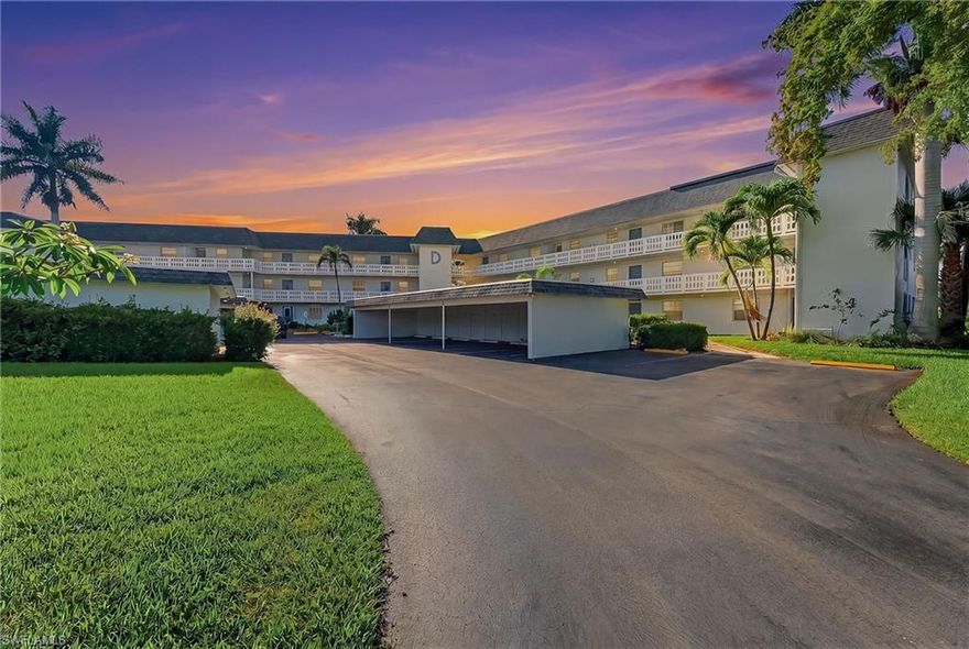 Discover one of the best values for a three-bedroom condo in Naples in the welcoming 55+ Vista Palms community, ideally located within the highly desirable Lely Country Club area between downtown Naples and Marco Island. This spacious ground-floor corner residence offers over 1,300 square feet of comfortable living space with peaceful golf course views, presenting an exciting opportunity to personalize, add value, or simply enjoy as-is as a full-time residence, seasonal retreat, or investment property.

Thoughtfully maintained and offered unfurnished, the condo features a bright and functional layout with an expansive lanai that adds valuable flexible living space perfect for morning coffee, relaxing afternoons, or casual entertaining. Additional highlights include walk-in closets in the bedrooms, in-residence laundry with a separate laundry room, covered parking with extra storage, and convenient ground-floor access with no stairs to navigate.

Built with solid concrete block construction for durability and insulation, Vista Palms offers an active lifestyle with a heated pool, clubhouse, billiards, card rooms, TV lounge, library, shuffleboard, cornhole, barbecue areas, and a welcoming social atmosphere. Just minutes from Naples’ renowned Gulf beaches, championship golf, shopping, dining, and the vibrant energy of 5th Avenue South, this is an exceptional opportunity to enjoy the very best of Southwest Florida living.