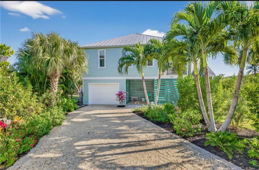 Welcome to this beautiful home in the heart of the island! This 3 bedroom 2 bathroom home is ready t0 MOVE IN! Florida bright colors, beachy decor AND minutes from the BEACH by bike! 
Built in 2014 - it sits nestled in next to the peaceful Sanibel River surrounded by a lush landscaped yard. 
The coastal aluminum Roof is a 2024 among other great features including sitting on a half acre on the cul-d-sac of a quiet community.
The home is ready and waiting for someone to move in and enjoy what Sanibel has to offer in the sun!
The huge screened in porch overlooking the spacious back yard is one of those features. Hardie board siding, Aztec decking, hardwood floors, marble coutertops, eight foot doors, and 42" cabinets. There is plenty of room for a pool!
Its a MUST SEE! Stop by and see what Sanibel Living is all about!