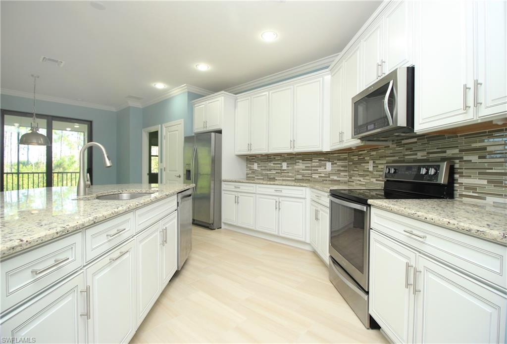 COACH HOMES AT LIVINGSTON LAKES - Residential