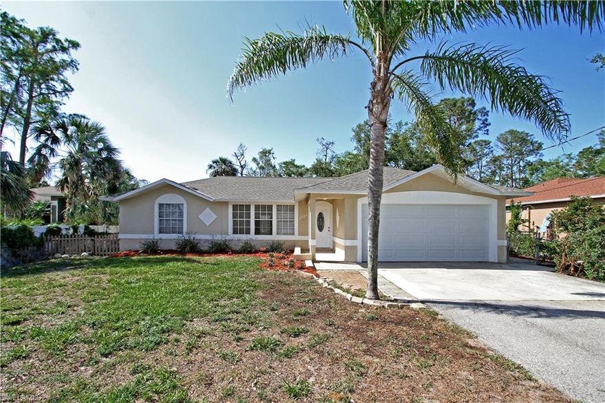 A great opportunity to own this beautiful and spacious  home with 3 bedrooms, 2 bathroom,oversized 2 car garage with a long  private asphalted driveway on the great high and dry lot.Enjoy country living close to the  city with no housing association fees!  Well cared front yard is fully fenced with lots of potential uses on the back- space for entertaining  ,large  space for pool ,tropical garden, outdoor fireplace, playground for  kids & pets.Golden Gate Estates provides owners the freedom of parking your boat or RV while giving you privacy and no HOA restrictions yet you can still easily enjoy amenities Naples has to offer with only a short drive!Home features brand new  roof, Updated HVAC system 3 yrs old, new wood kitchen cabinets, brand new stainless steel energy efficient appliances, tile  flooring , baseboards,interior doors,large windows, newer well with water equipment,new interior/exterior paint, Both bathroom have an updated sink with  shower / tub.The design offers  vaulted ceilings in living room/dining room area with gorgeous triple windows in the front.The house is in immaculate condition ready for move in.Guest bedrooms are sizable with walk in closet space.Must see