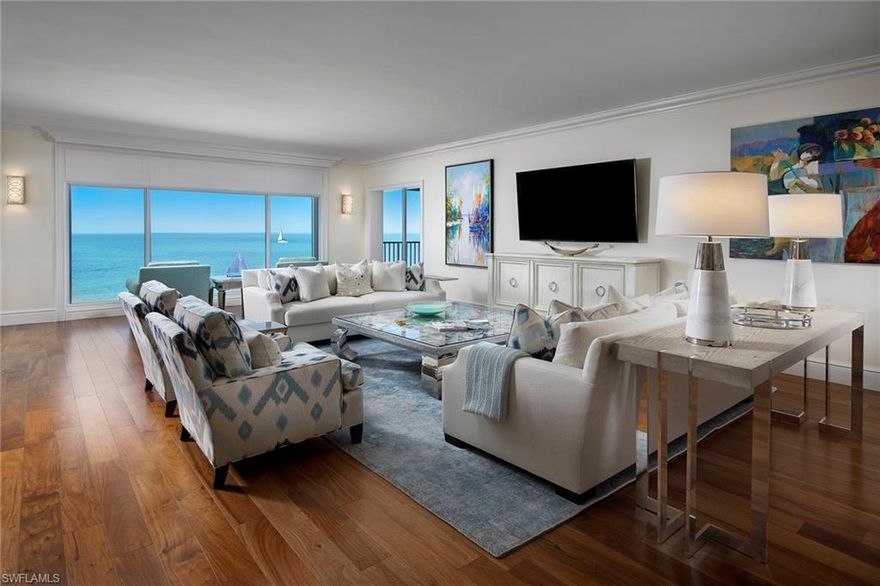 Directly on the sand of the Gulf beach, this 5th-floor residence provides stunning panoramic views and endless awe-inspiring sunsets. The thoughtful four-bedroom floor plan is surrounded by windows bringing in the natural light and showcasing the view. Rich hardwood flooring and a neutral color palette throughout provides an elegant motif, ideal for nearly any design taste. Guests will feel relaxed in the spacious guest rooms with well-appointed baths, and residents will appreciate the feel of a single-family home with all the conveniences of a condominium. In one of the most sought-after condominium buildings with an ideal southern location close to downtown, and a true boutique feel. An assigned parking space equipped with a Tesla charging station perfectly rounds out the lifestyle that is found while living in the Laurentians.