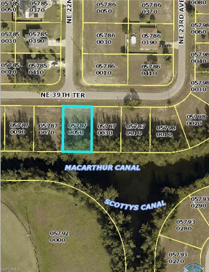 Check out this WATERFRONT lot in NE Cape Coral. Southern exposure parcel ready to build on or invest now while prices are still low in this area. This CANAL LOT is in the BOOMING neighborhood near Island Coast High School and Gator Cir. New construction homes are being built all around! Come take a look!