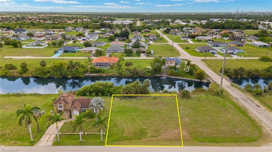 Beautiful 120' freshwater canal Lot in NE Cape Coral. NOT IN A FLOOD ZONE. This buildable lot offers a scenic canal view where you can watch the sunrise on this Eastern rear exposure lot and enjoy outdoor living without the intense afternoon sun. Whether you envision a cozy retreat or a long-term investment in one of Southwest Florida’s fastest-growing cities, this property delivers both potential and value. Conveniently located near shopping, dining, schools, and with quick access to main roads.