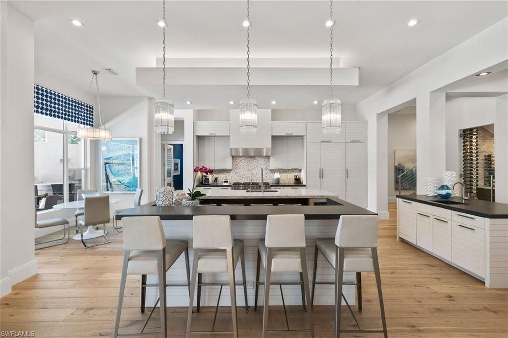 Photo of 745 Riviera DR, NAPLES, FL 34103 (MLS # 225062712)