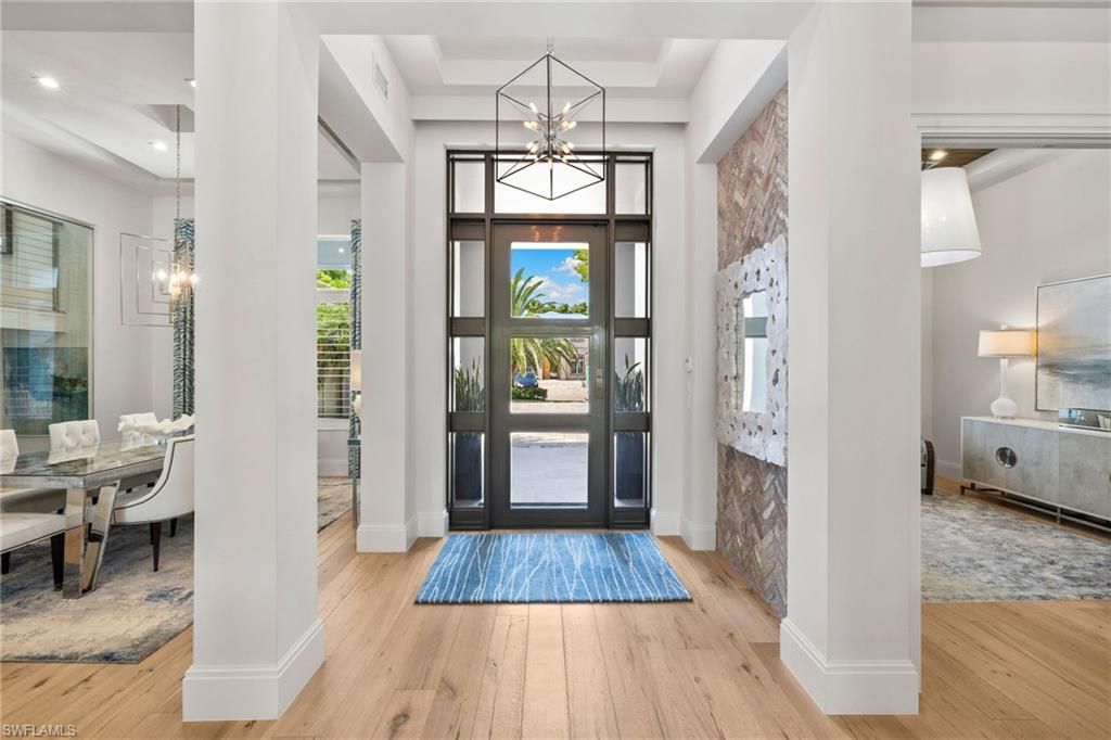 Photo of 745 Riviera DR, NAPLES, FL 34103 (MLS # 225062712)