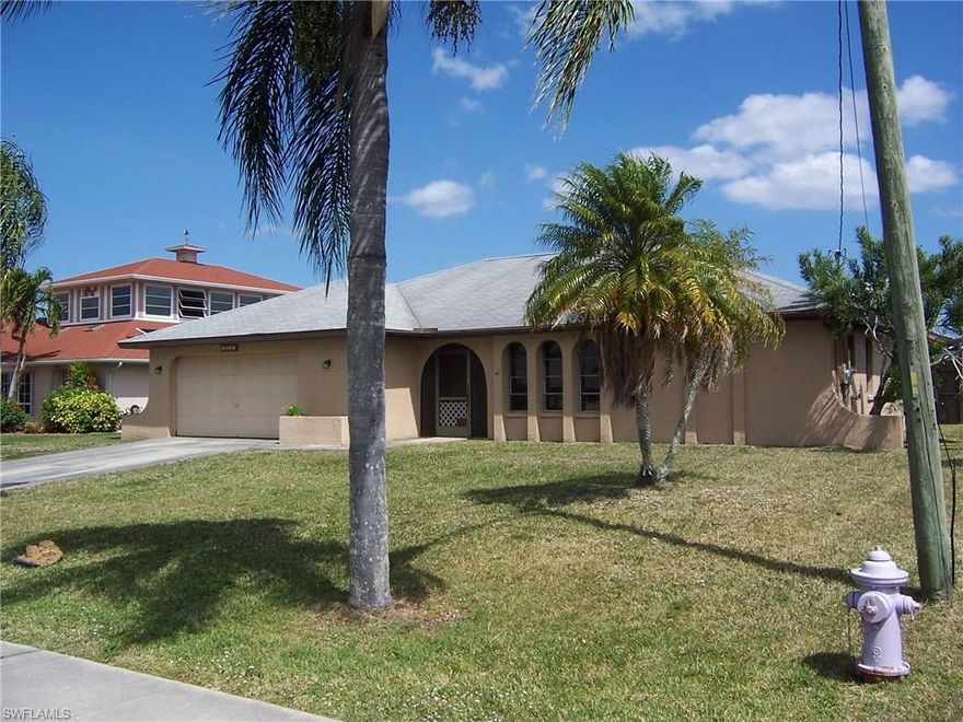 Awesome view of Shamrock Lake.  Conveniently located in the heart of the city with the lakefront lifestyle.  Split plan 3 bedroom, 2 bath (w/pool bath) home with NEW refrigerator (2015) and inside laundry.  Formal living room and dining room; large family room with vaulted ceilings, off the kitchen. All bedrooms have walk-in closets and 18" tile throughout the home. Two car garage has a remote and garage door opener.  Nice pool area with screen enclosure and panorama view of lake with cantilever dock. This is a rare gem in this Lake-style living area home for fishing, boating or jet-skiing to be enjoyed.