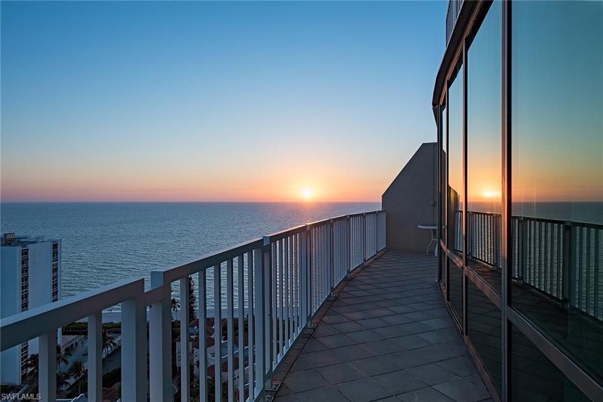 THE VIEW REALLY IS BETTER AT THE TOP!  Sitting above everything to the south, this never before available, one of a kind penthouse has views that go on forever sweeping from Venetian Bay to the east, south toward the pier and Marco and west toward the Gulf of Mexico.  The surrounding vistas are engaging by day and mesmerizing by night.  All the very spacious rooms have these show stopping views including the master bath and there are two, his and hers.  Adding to the drama, there is an open balcony for top of the world sun bathing and a prow-of-the-ship sitting/dining area in the kitchen with floor to ceiling glass windows hanging over Venetian Bay. The perks of the penthouse level also include higher ceilings and three parking spaces in the garage.  This special beachfront residence definitely has the wow factor and is perfect for the person who wants to create something truly unique.