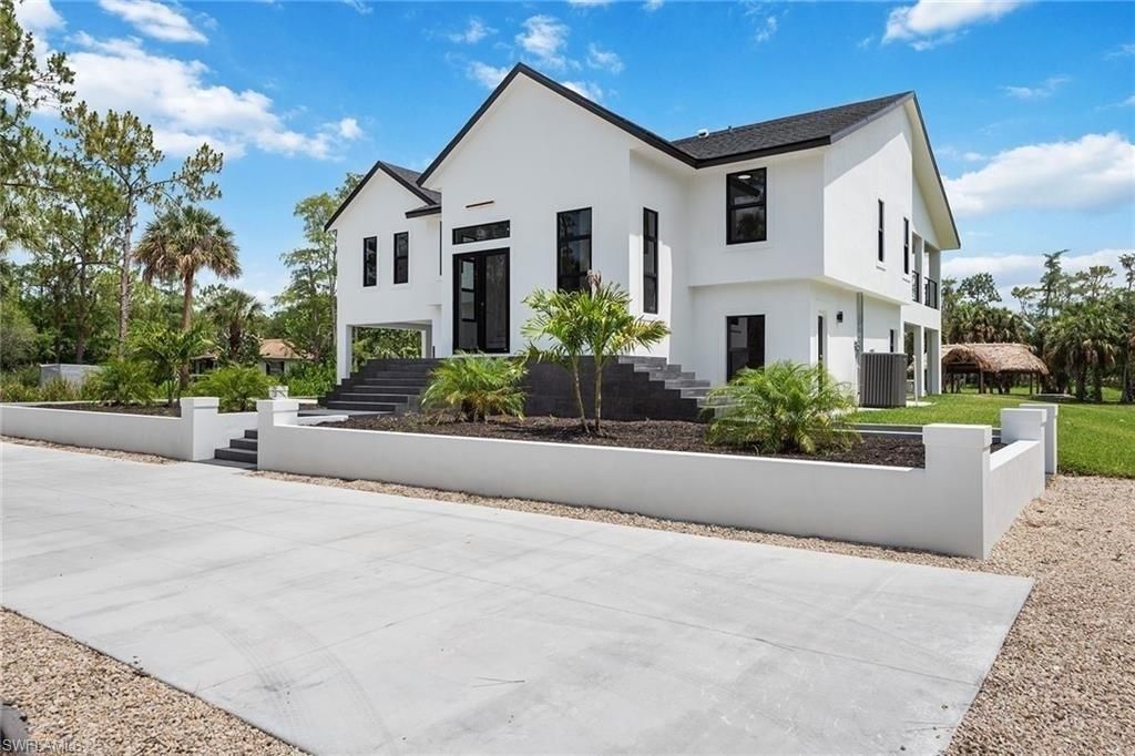 Photo of 240 33rd AVE NE, NAPLES, FL 34120 (MLS # 226008483)