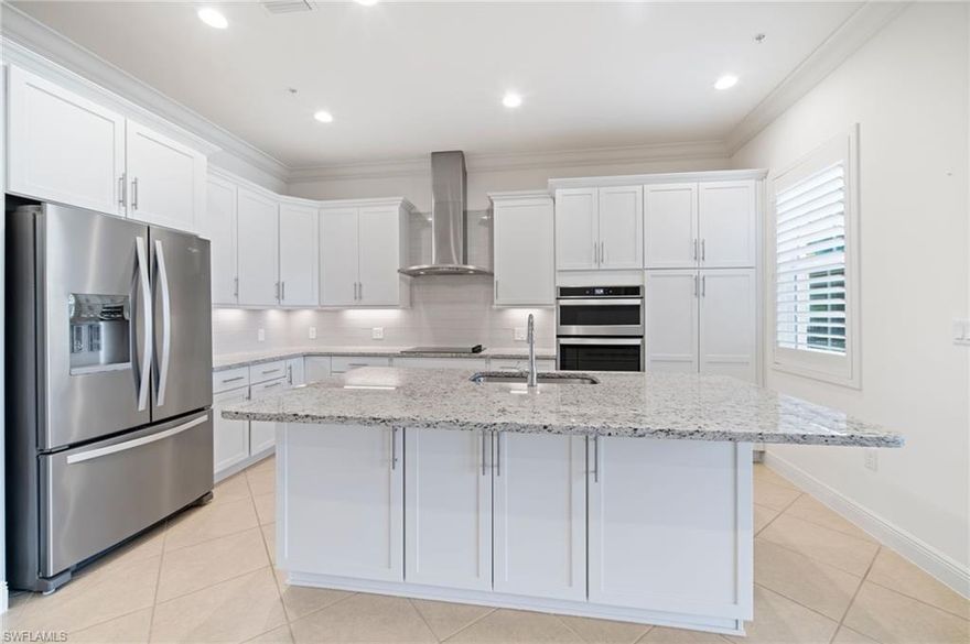 Newest mid rise community in Estero. Nothing builder grade here. Fully insulated interior walls, 8 foot tall interior doors, impact exterior doors and windows, 10 foot ceilings and an oversized 2 car garage. Open floor plan, kitchen with white shaker cabinets, grey subway tile backsplash, wall oven and microwave, direct vented stainless hood, large island with additional storage to entertain your guests.  Dining room and living room offers crown molding and a fully screened lanai with an additional electric roll down hurricane shutter.  4 TVs on the wall are included, 5 ceiling fans, lots of recessed lights.  The main bathroom is your personal spa, free standing tub, walk in shower, dual vanities and sinks.  Main bedroom has 2 closets with a private outside lanai.  Den/study has double french doors, hall bath has a tiled shower with a frameless shower door.  interior laundry room also has a laundry sink.  2 additional locations outside of the unit for additional storage.  Genova offers one of the best locations in Estero and you will see for yourself the quality as soon as you walk in the front door.  Welcome to your new Genova lifestyle.  Agents please read confidential comments.