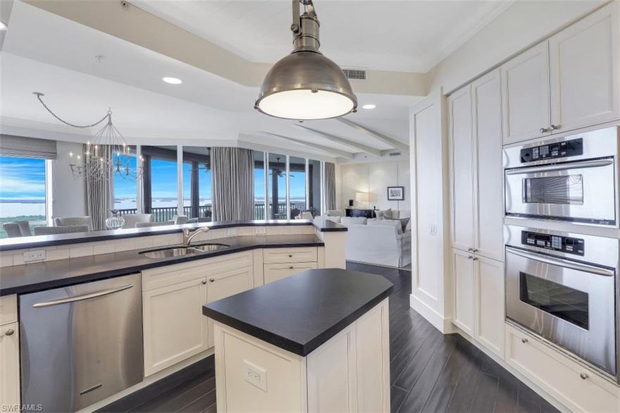 This Steven G Designed home in the sky offers expansive gulf & bay views!  The great room floor plan invites you in and the views draw you outside!  Treviso at the Colony offers a fitness center, social room, resort style pool and private theatre. Nestled within Pelican Landing, The Colony Golf and Bay Club offers waterfront dining at the Bay Club, Golfing, tennis courts, private beach access, pool, fitness center, etc. and its a short distance to the Coconut Point shopping experience.