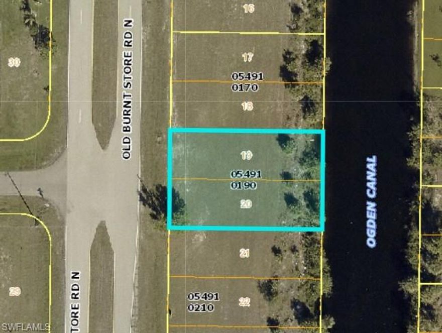 This vacant canal waterfront lot presents an excellent opportunity to build your custom home in a growing area of Cape Coral surrounded by newer construction and natural beauty. Positioned along a navigable canal with Gulf access, the property offers the ideal setting for enjoying Southwest Florida’s boating lifestyle while still providing a sense of privacy and space. The lot’s layout is well suited for a variety of home designs, with room for outdoor living features that take advantage of the water view. Located near Burnt Store Road, the property allows for convenient access to shopping, dining, and everyday essentials, while remaining close to parks and preserves that highlight the area’s coastal appeal. With waterfront access and long-term potential, this homesite is well suited for buyers looking to invest, build, and enjoy the Florida lifestyle.