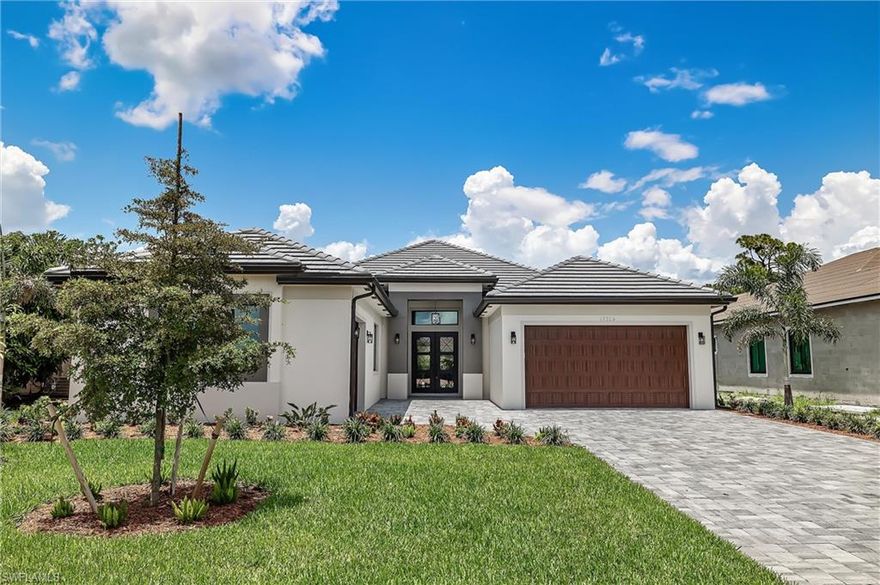 AVAILABLE NOW - NEW CONSTRUCTION! Home is 3,051 square feet of living space (4,044 SF total) with 3 bedrooms / 3.5 bathrooms / dedicated office on a beautiful preserve lot. The home features a large, open floor plan living area for entertaining. Soak up the sun on the screen-enclosed lanai that comes complete with a pool and sundeck! Home includes multiple upgrades, including: upgraded exterior double doors, decorative multi-tiered tray ceilings, hurricane safe impact windows and doors, oversized tile floors, a stunning built-in TV wall with electric fireplace, crown molding, a 3-car garage, floated stucco and drywall, and decorative exterior tile accents. Open kitchen is equipped with upgraded key Bosch appliances, quartzite counter tops, a large decorative island, and a walk-in bar with wine refrigerator. Master bathroom complete with an oversized glass enclosed rainfall shower with a fixed shower-head, separate body sprayer, and a freestanding tub. This home is truly beautiful inside and out.