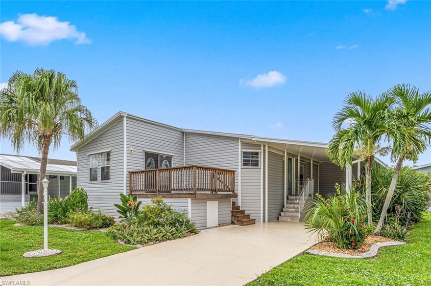 Come enjoy the relaxed Southwest Florida lifestyle in this beautifully remodeled home in the sought after Windmill Village 55+ community - with direct gulf access marina!  The home's remodel was recently finished and includes a NEW SHINGLE ROOF, NEW vinyl siding, NEW AC, NEW shaker style kitchen cabinets, NEW large center island & breakfast bar, all NEW granite counters and farmhouse style sink, NEW luxury vinyl flooring, two NEW bathrooms with walk in showers and so much more!  Easy to keep and perfect for entertaining year round. The home also offers a deck with storage under, a storage/workshop and plenty of carport and driveway parking.  This very active community is lovingly maintained and the pride of ownership shows!  Every month a full events calendar and newsletter offers all sorts of activities on-site and off! All this topped off with a gated entrance, easy access to I-75 and lots of shops while still being quietly tucked away in a truly perfect setting.  Resident owned community - there is an $18k buy-in park share / bond in addition to the purchase price. The 'Buy-in / Park shares' is refunded to seller upon sales/transfer.