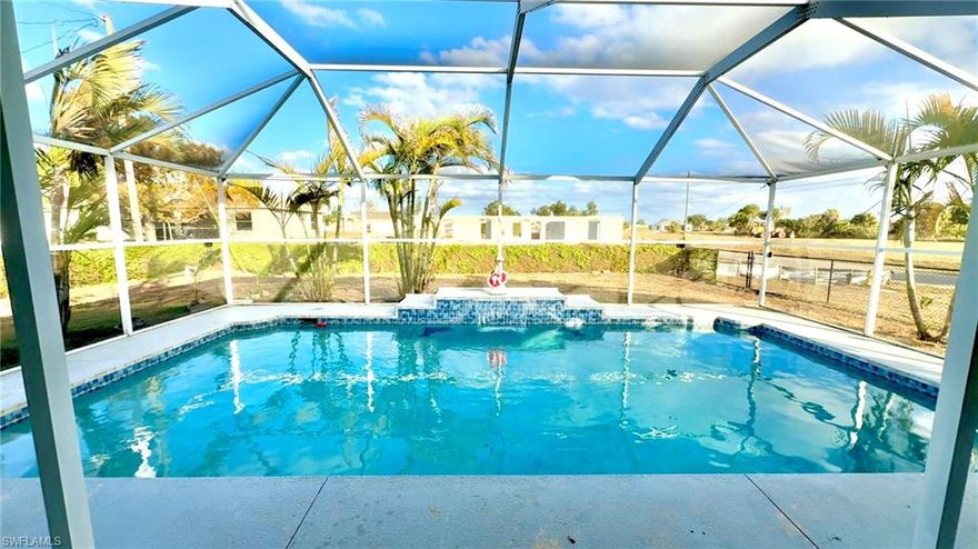 Best priced pool home in Cape Coral with a completely renovated kitchen, floors, bathrooms, and so much more. NO FLOOD INSURANCE REQUIRED offering the buyer/s huge savings. This coastal beauty captivates you by offering everything you want in your Florida home at a price you can feel great about! All appliances are new from the kitchen to the laundry room! As soon as you walk in the front door you will notice the desirable open floor plan with a view of the pool. The beautiful new Caribbean colored quarts waterfall countertops and backsplash are a fantastic central focus in the heart of your home. This split floor plan is ideal. The oversized under truss lanai is the perfect outdoor scape for all of your backyard poolside family adventures. The large fenced in backyard is great for kids, pets, a garden, firepit area, or whatever your heart desires. The master bedroom is an oasis and has a completely remodeled en-suite bath as well as a stunning new accent wall. This home also features a guest en-suite bath that opens up to the pool area making hosting a breeze. The remodeling extends from impact glass in the front of the home, new baseboards throughout, new lifeproof laminate flooring, newer paint, HVAC airflow upgrade, a new pool pump, and so much more! This must-see pool home is priced to sell so don't miss out on this fantastic opportunity! Conveniently located close to some of the best beaches in the world and even closer to fantastic shopping, dining, nightlife, entertainment, boating, and multiple airports.