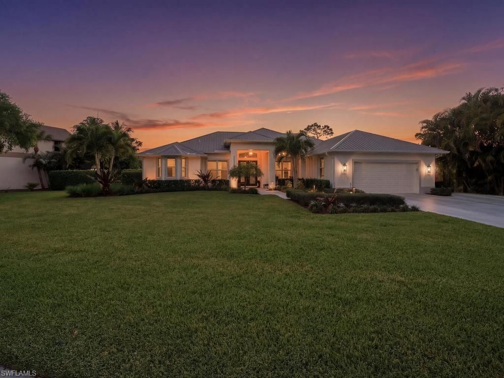 Photo of 10925 Parnu ST, NAPLES, FL 34109 (MLS # 226016049)