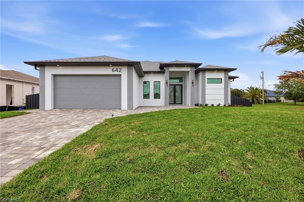Photo of 642 NW 28th TER, CAPE CORAL, FL 33993 (MLS # 226011714)