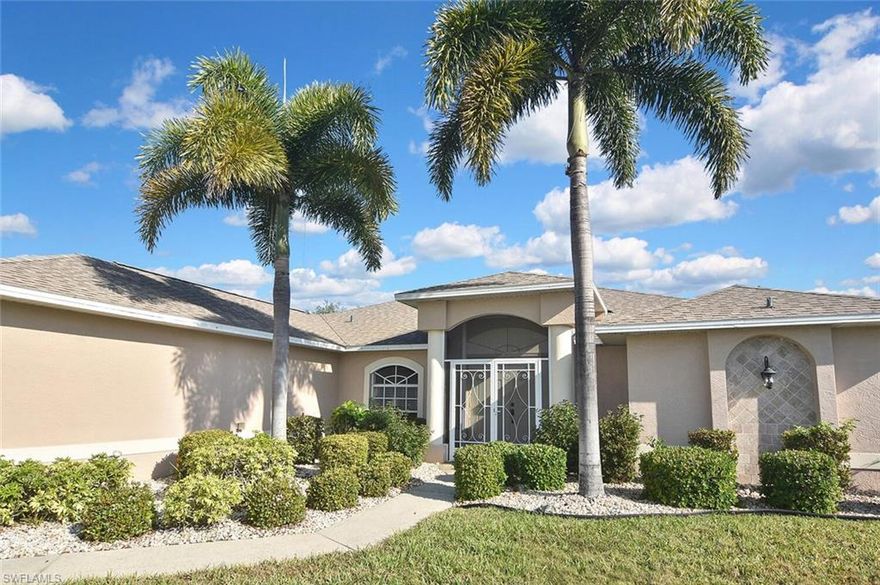 Welcome to this spacious and beautifully appointed 4-bedroom, 2-bath pool home featuring a desirable 3-car side-load garage, perfectly positioned on an oversized corner homesite in Southeast Cape Coral. Conveniently located just off Veterans Parkway, this residence offers effortless access to Fort Myers. Designed with both comfort and style in mind, this home showcases an expansive and thoughtfully designed floor plan ideal for refined living and entertaining. Step outside to your private outdoor retreat, complete with a sparkling pool and spa, and a large under-truss lanai—perfect for relaxing or hosting guests in a serene setting. The fenced yard provides both privacy and a secure space for pets. Inside, you’ll find multiple inviting living spaces, including a formal living room, elegant dining area, and a generous family room. The well-appointed kitchen offers abundant cabinetry, ample prep space, and a charming breakfast nook for casual dining. All four bedrooms feature walk-in closets, delivering exceptional storage and convenience. Recent upgrades include a newer roof, hurricane accordion shutters, and electric roll-down shutters on the lanai, offering enhanced protection and peace of mind. Located in a no flood zone with assessments paid, this home adds both value and confidence to your investment. With its impressive layout, desirable features, and prime location, this residence presents an exceptional opportunity for a growing family or savvy investor.