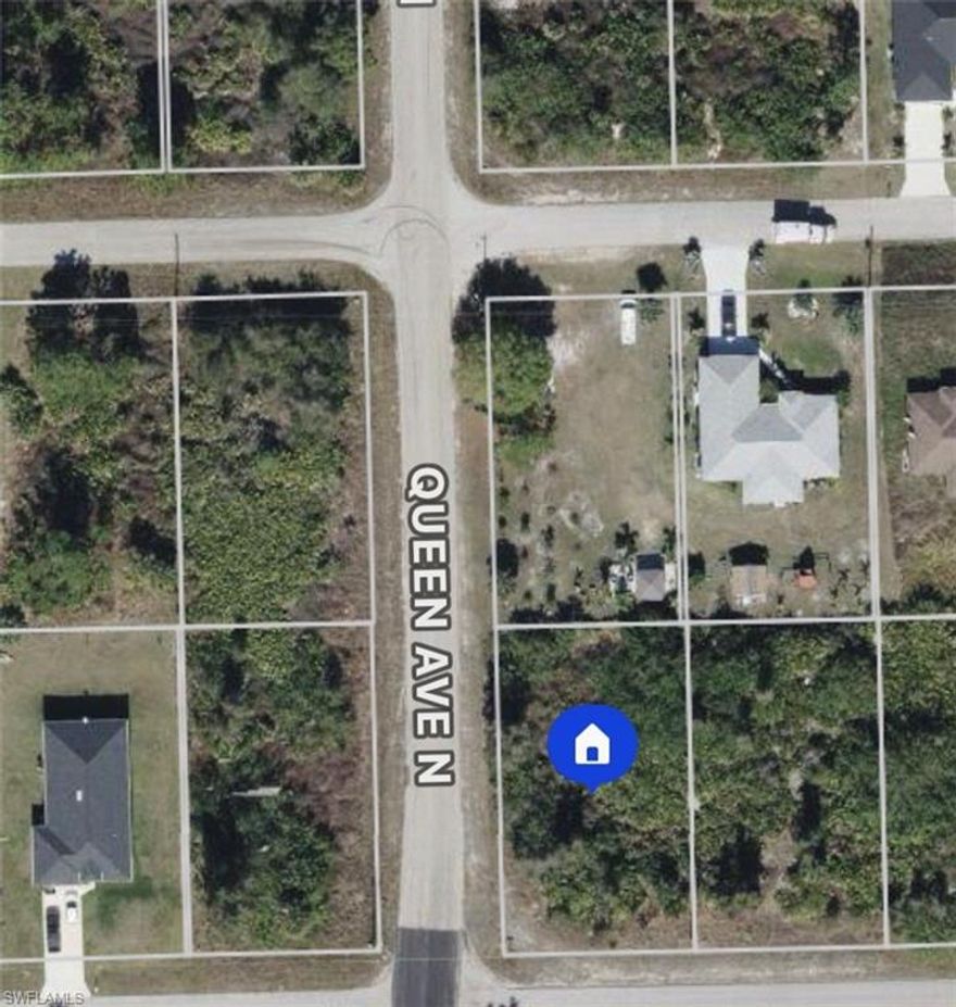 Corner lot with paved road and electric and the curb! Excellent opportunity to buy and hold or to build. Hablo Español!