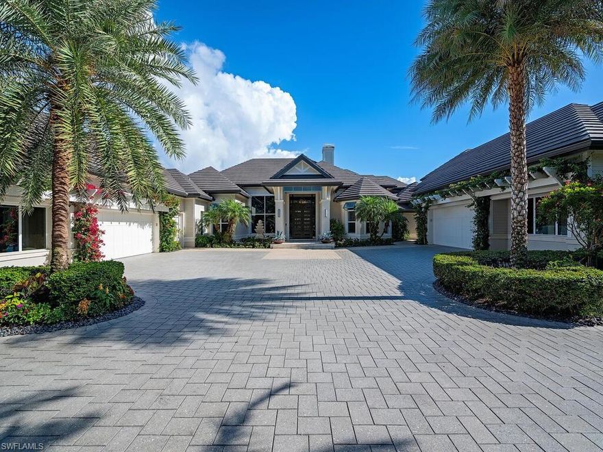 Welcome to Unparalleled Elegance in Bonita Bay. Nestled in the prestigious Bonita Bay community, in the subdivision of Spring Ridge, this exquisite 6,100+ square foot estate embodies luxury and sophistication. From the moment you arrive, the breathtaking curb appeal captivates, featuring a beautifully landscaped circular driveway and a fountain entrance that sets the tone for the home’s refined ambiance.  Meticulously renovated between 2013 and 2017, this estate offers an array of high-end features and thoughtful design elements. The gourmet kitchen is a chef’s dream, while the expansive primary suite boasts a spa-like bathroom with dual showers, a custom walk-in closet with its own laundry, and exceptional attention to detail. Guests will appreciate the privacy of three ensuite bedrooms, while the den, family room, formal living and dining rooms, and separate art studio provide versatile spaces for both relaxation and creativity.  This home offers a total of eight baths, ensuring convenience and comfort for all. The 2,600+ square-foot screened lanai is an entertainer’s paradise, showcasing a remodeled pool with stunning gas fire bowls, a custom mosaic outdoor shower, and a spacious covered area featuring a granite bar, pizza oven, warming drawer, grill with hood, 75” outdoor TV, a large trough fireplace, and multiple dining areas for hosting unforgettable gatherings.  Car enthusiasts will revel in the two separate garages, each located on opposite sides of the home. One garage includes a car lift, and together they can accommodate up to eight vehicles with an additional lift.  Set within the highly coveted Bonita Bay community, this property grants access to world-class amenities, including a state-of-the-art fitness center, tennis and pickleball facilities, and five championship golf courses (membership required).  This extraordinary home represents the pinnacle of luxurious living in Bonita Bay. Don’t miss the opportunity to make it yours.