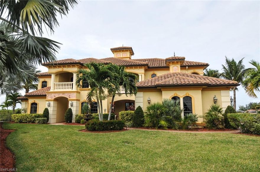 WOW!!! ONE OF THE MOST Luxurious Estate Homes in the Cape. 5 BR 4 1/2 BA, Den, Dinning Room, Exercise Room, Elevator, 3 Balconies, 5,229 sq foot under air. Too many features to list. Direct Gulf Access, 304' seawall w/huge dock that has 2 boat slips, one with lift & canopy. House has automatic Propane Generator with 500 Gal tank. Impact glass, Full House Reverse Osmosis, 100' Private Drive with Circular Drive at end with gorgeous water view. House Located in the Beautiful Gated Community West Cape Estates.