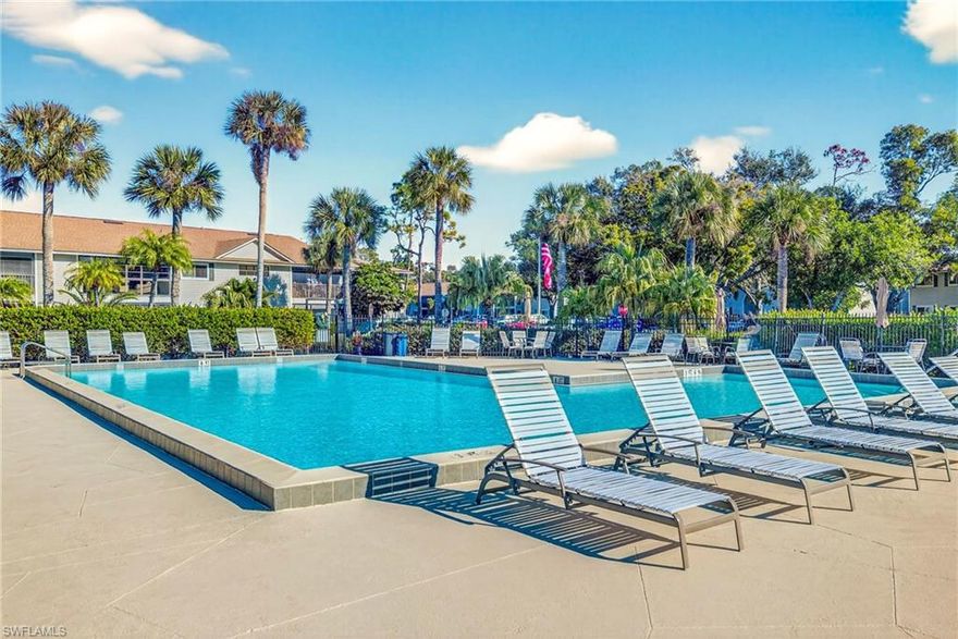 Location is impossible to beat! Very well maintained home in the beautiful GATED community of Summerlin Woods! Great neighborhood feel, mixed with full time and seasonal retirees, as well as young families. Whether you enjoy spending your free time by the pool, walking, or riding bikes, the peaceful atmosphere and safe surroundings that accompany you are absolutely PRICELESS! Literally, 1 minute walk to the POOL!  NEW ROOF 2022!  This 2 bedroom, 2 bathroom 2nd floor condo, with an enclosed lanai UNDER AIR, with UV blocking screens and tinted windows for additional privacy and energy efficiency, provides additional square footage for whatever flex space you may need! An office? A play room for the kiddos or small pets? The possibilities are endless! This condo showcases pride of home ownership and it shows! VAULTED ceilings provide a more open and spacious feel! LVT floors in both bedrooms! NO CARPET! Updated interior painting! Partial updating in BOTH bathrooms. Both bedrooms have large walk-in closets! Guest bedroom has direct access to the Guest Bath!  Floor plan is very well laid out.  Same owner-occupied for the past 18 years and upkeep has always been a top priority! This home is SUPER CLEAN and NEEDS NOTHING. WALKING DISTANCE to Lakes Park, which has its own designated crosswalk and traffic light just outside of Summerlin Woods, and always caters to vehicle and pedestrians crossing Summerlin! Does traffic stress you out? This is the PERFECT location for free-flowing Summerlin Road with access to everything you need within minutes! Summerlin Woods also offers a beautiful community pool, tennis courts, walking paths, and grilling area. Do NOT let this great home pass you by!!!  PRICED RIGHT!